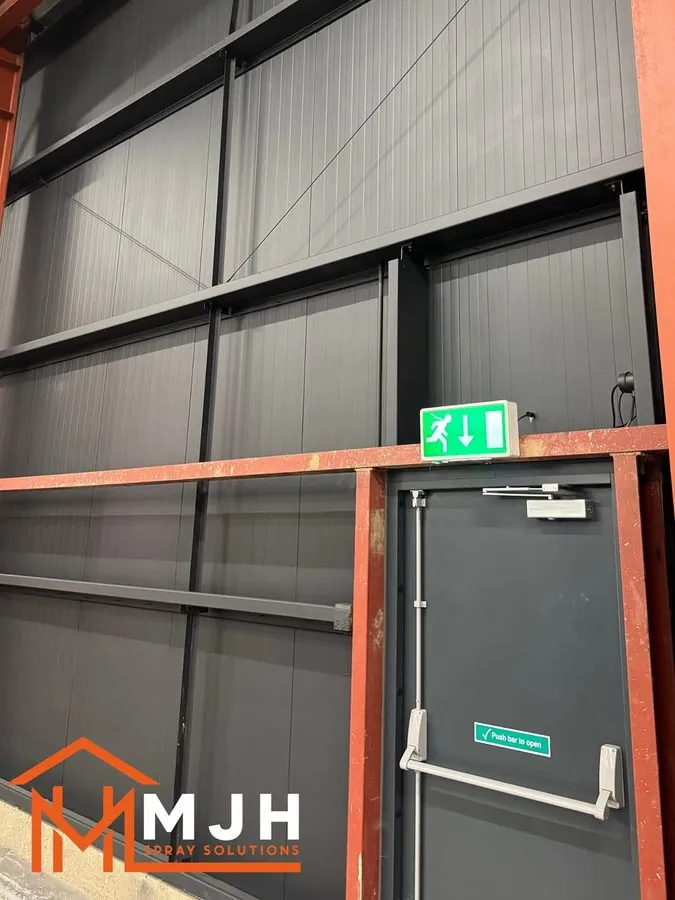 Industrial fire door and cladding sprayed at a commercial unit
